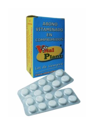 Fotografía de una caja azul con dos blísters de comprimidos blancos delante. En la etiqueta frontal se lee: “abono vitaminado en comprimidos” y “los de siempre”, y el logo de Vital Plant